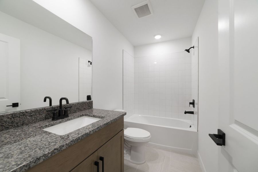 Furnished interior view inside a new home in Towns at Greenleaf, Oviedo (Image 16).