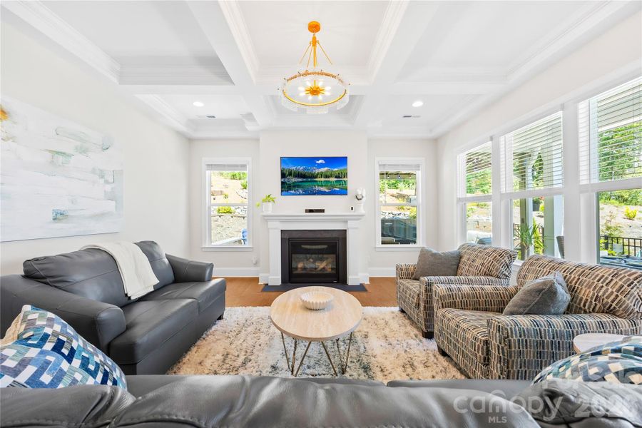 Living Room with Cofferred Ceiling and Fireplace Living Room with Cofferred Ceiling and Fireplace