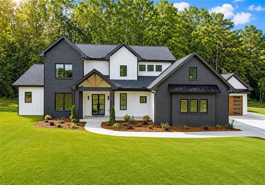 Front exterior of a new home in , Cumming, GA, highlighting curb appeal (Image 31).