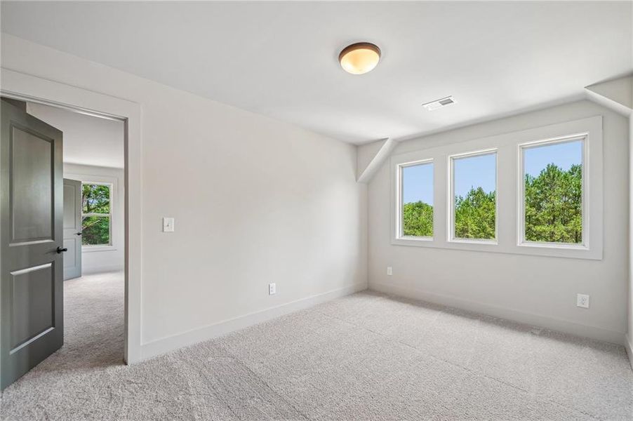 Spacious, unfurnished interior of a new home in Steeplechase, Hoschton (Image 37).