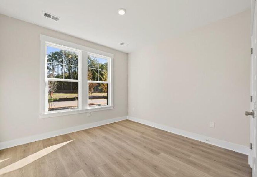 Spacious, unfurnished interior of a new home in Indigo Place, North Charleston (Image 14).
