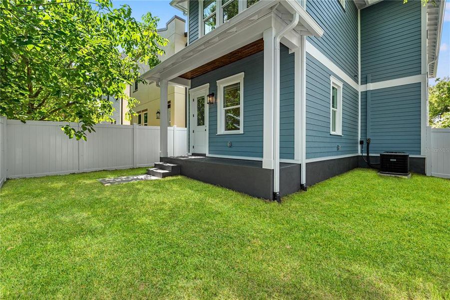 Exterior details and patio area of a home in , Tampa (Image 33).