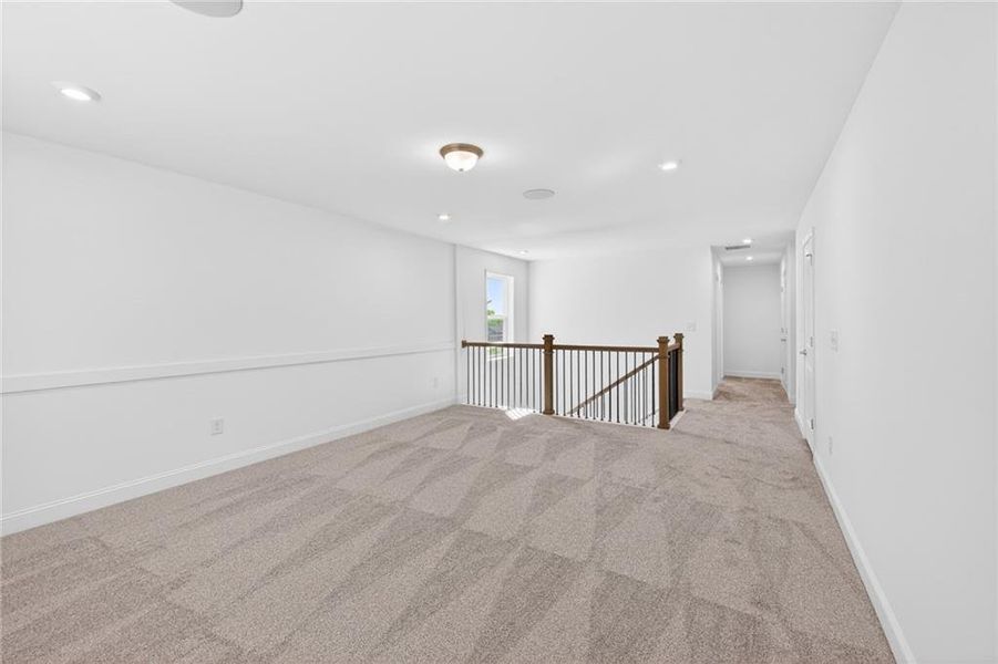 Spacious, unfurnished interior of a new home in Riversprings, Dacula (Image 40).