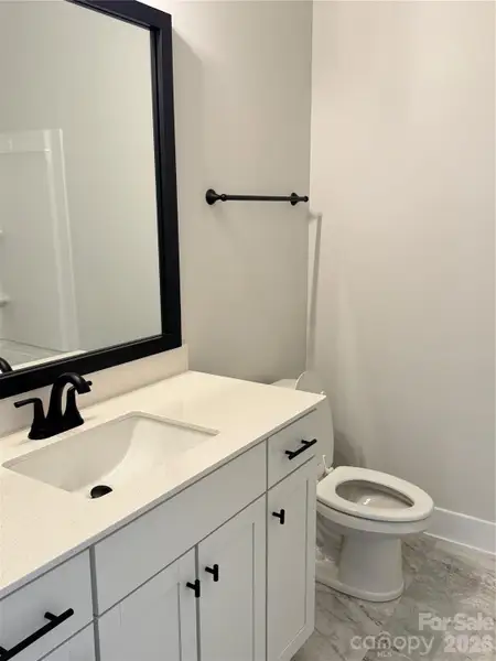 Furnished interior view inside a new home in Kerns Ridge, Salisbury (Image 10).