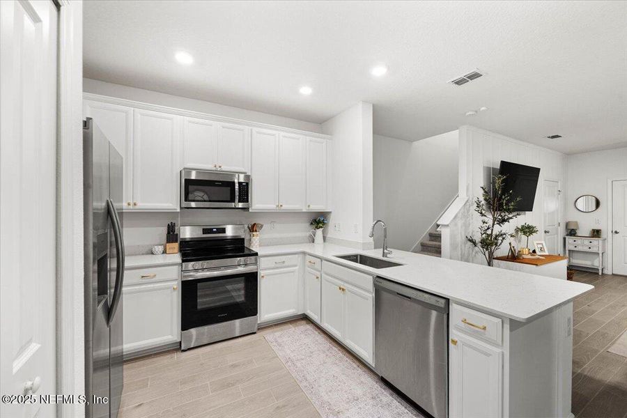 Furnished interior view inside a new home in Shearwater: Affordable Luxury Townhomes, St. Augustine (Image 9).