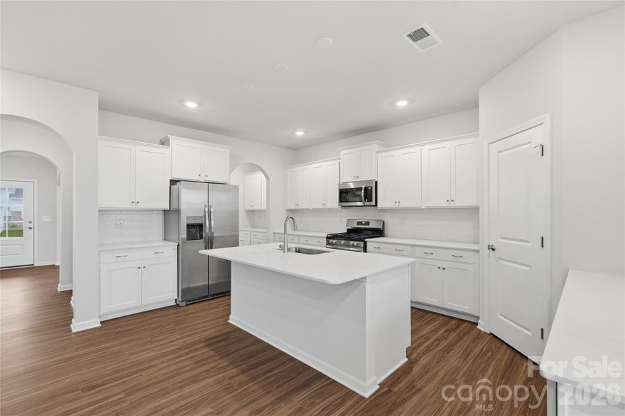 Furnished interior view inside a new home in Redhawk: Enclave, Belmont (Image 14).