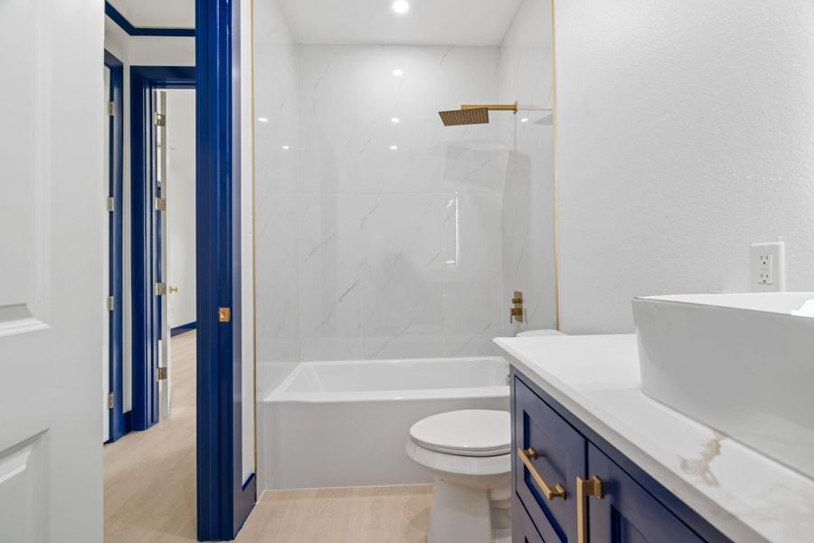 Hall Bath featuring a tub/shower combo. Hall Bath featuring a tub/shower combo.