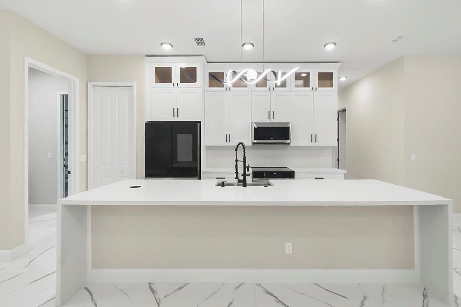 Furnished interior view inside a new home in , Port St. Lucie (Image 6).
