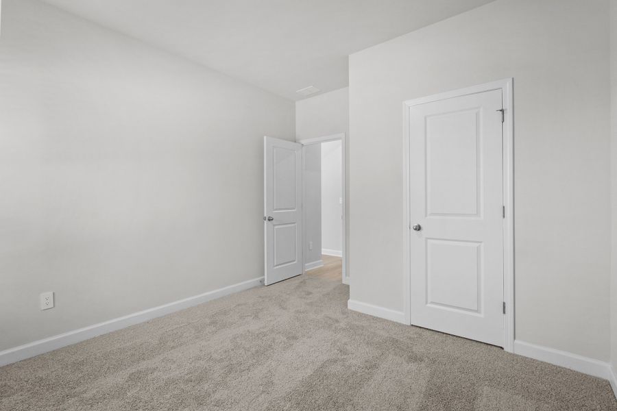 Spacious, unfurnished interior of a new home in Waterside - Coastline Series, Longs (Image 32).