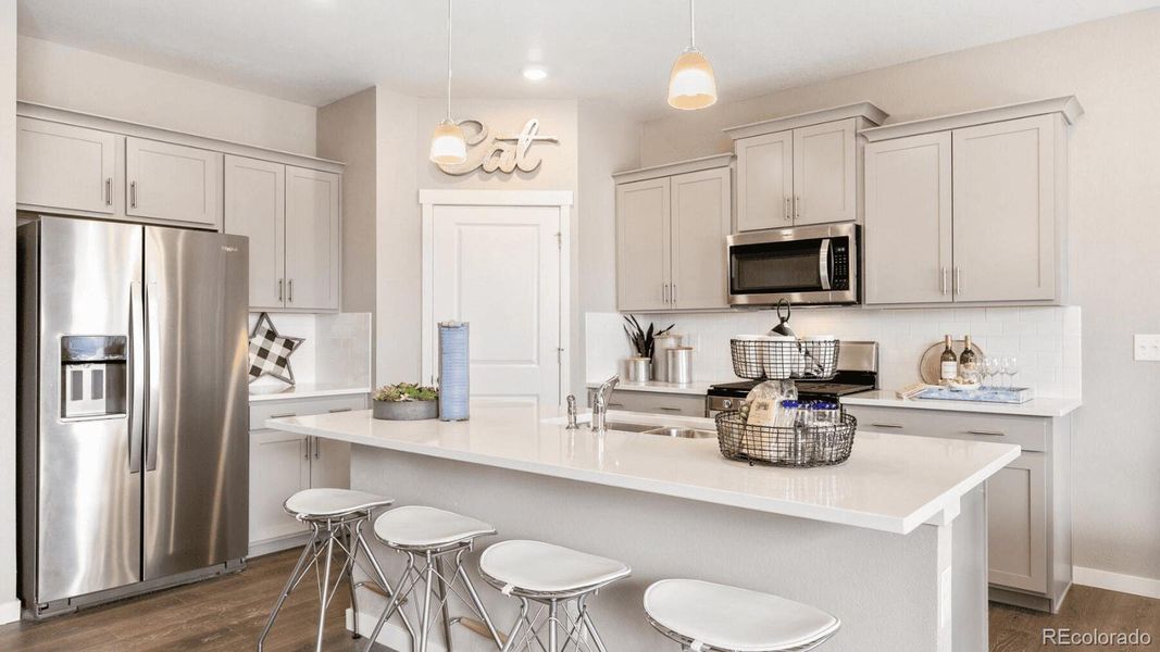 Furnished interior view inside a new home in Sky Ranch, Watkins (Image 7).