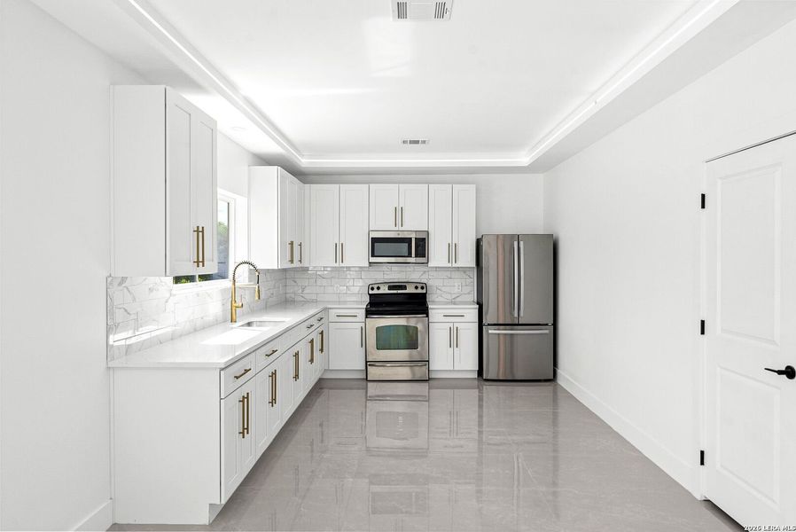 Furnished interior view inside a new home in , Kyle (Image 38).