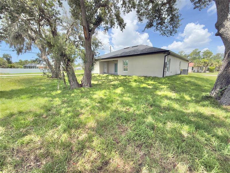 Front exterior of a new home in , Port Charlotte, FL, highlighting curb appeal (Image 21).
