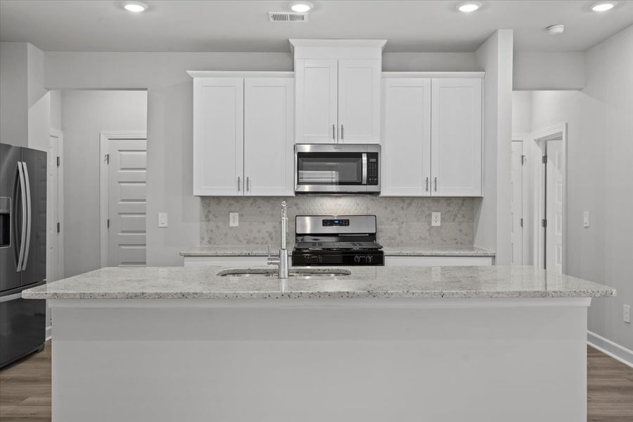 Furnished interior view inside a new home in Brayfield Manor - Heritage Collection, Wellford (Image 4).