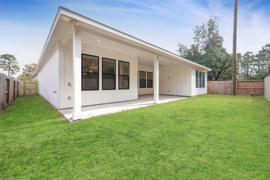 Exterior details and patio area of a home in , Humble (Image 4). Exterior details and patio area of a home in , Humble (Image 4).