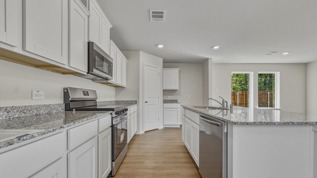 Furnished interior view inside a new home in Hanolley Hills, Sherman (Image 4).