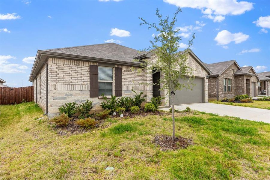 Front exterior of a new home in Rosewood at Beltmill, Fort Worth, TX, highlighting curb appeal (Image 21).