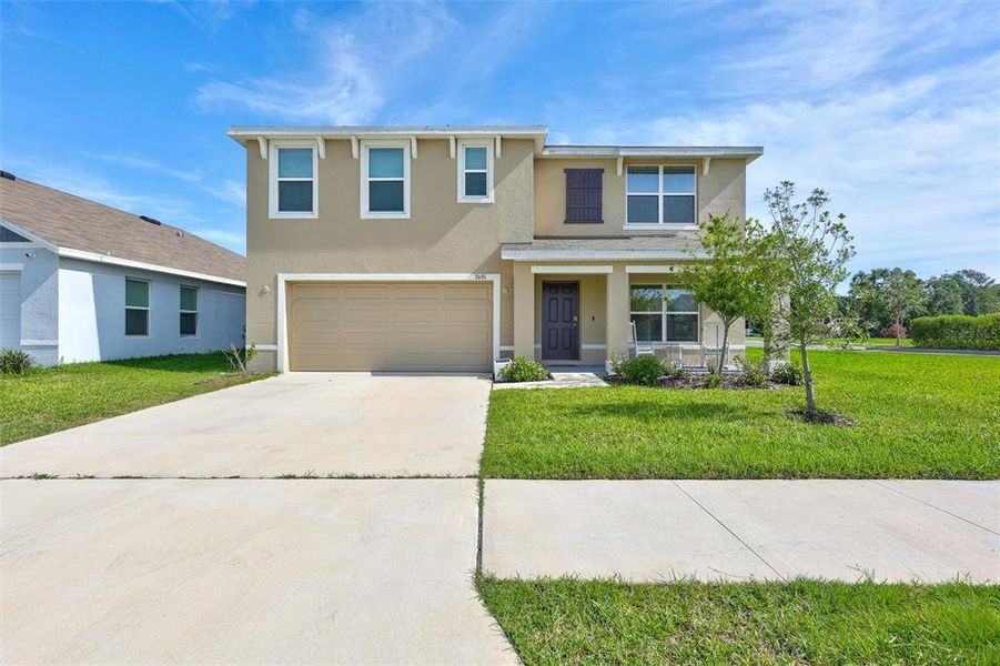Front exterior of a new home in , Tampa, FL, highlighting curb appeal (Image 25).