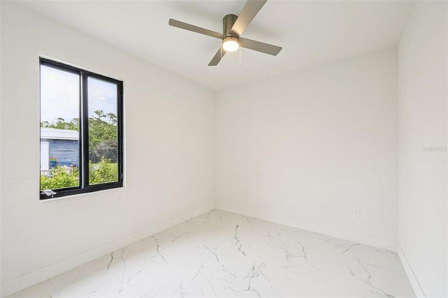 Spacious, unfurnished interior of a new home in , Port Charlotte (Image 17).