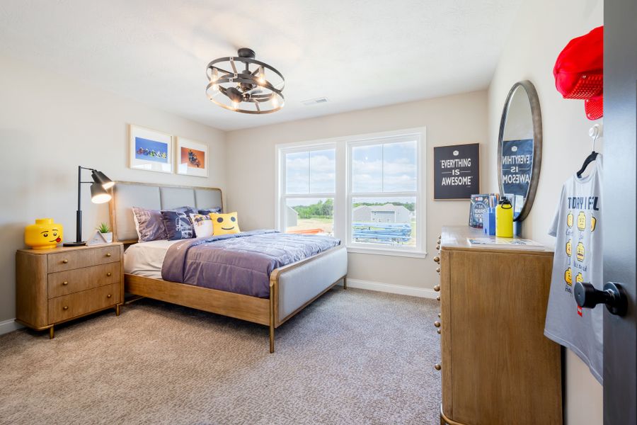 Representative furnished interior of a home built from the Charles by Fischer Homes in Twin Lakes, Hoschton (Image 42).