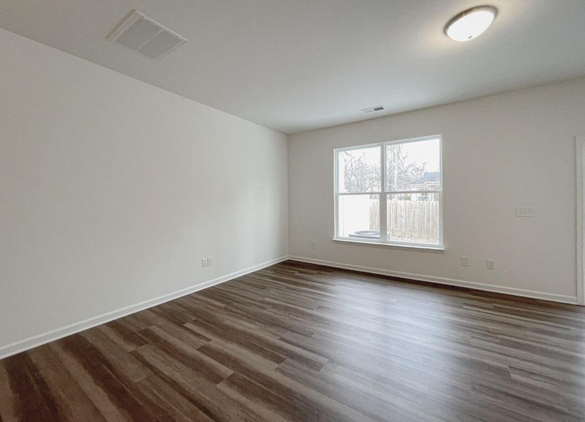Spacious, unfurnished interior of a new home in East Main Townes, Spartanburg (Image 16).