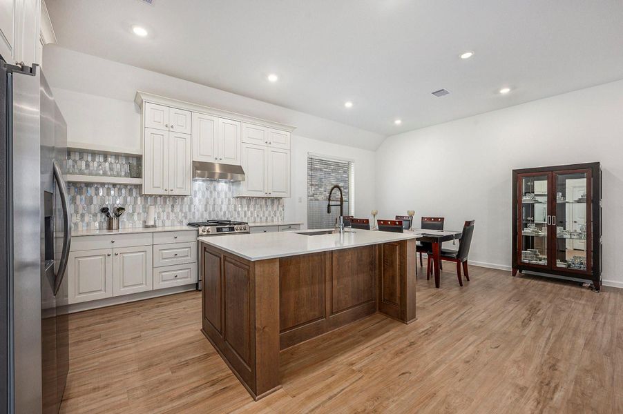 You'll love the huge island with farmhouse sink. You'll love the huge island with farmhouse sink.