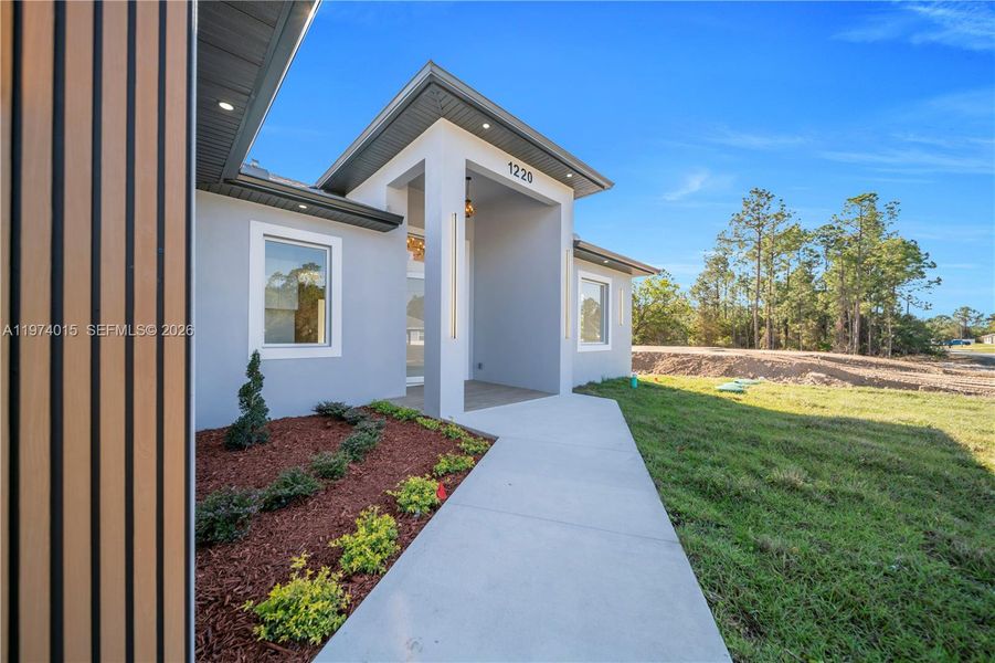 Exterior details and patio area of a home in , Lehigh Acres (Image 3).