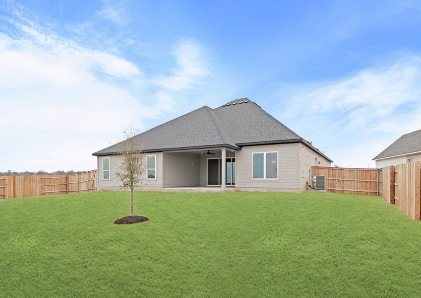 The back yard of the Fairview is fully fened-in.