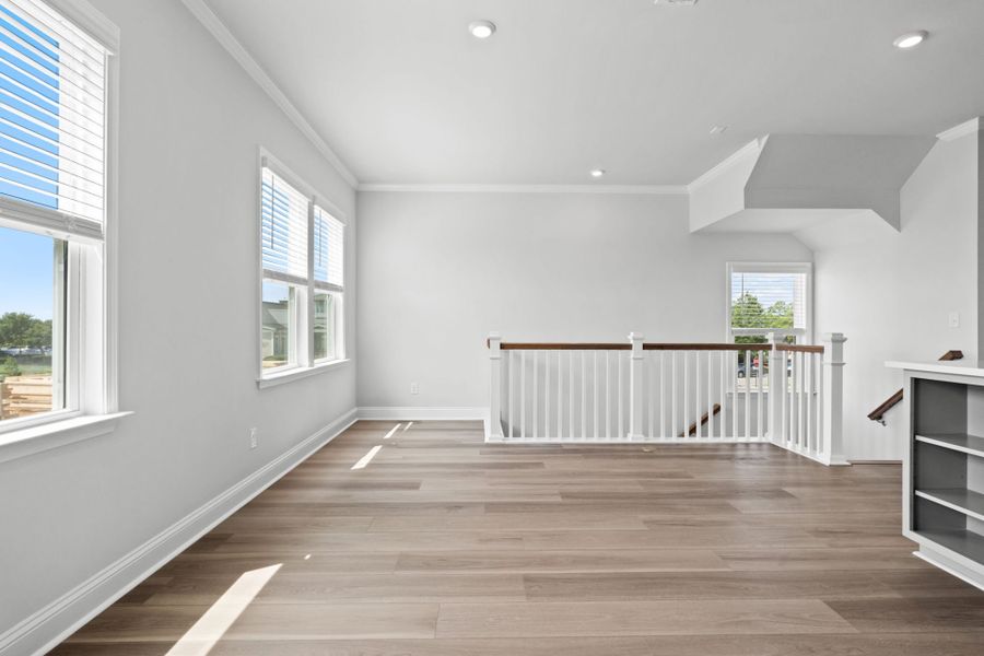 Spacious, unfurnished interior of a new home in Lakeside Townes at Riverlights, Wilmington (Image 22).