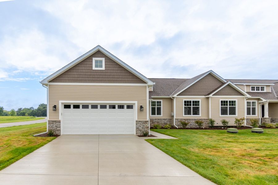 Representative exterior photo of a completed home built from the The Esher Paired Ranch Condominium by Norfolk Homes in Mystic Ridge, Whitmore Lake, MI (Image 30).