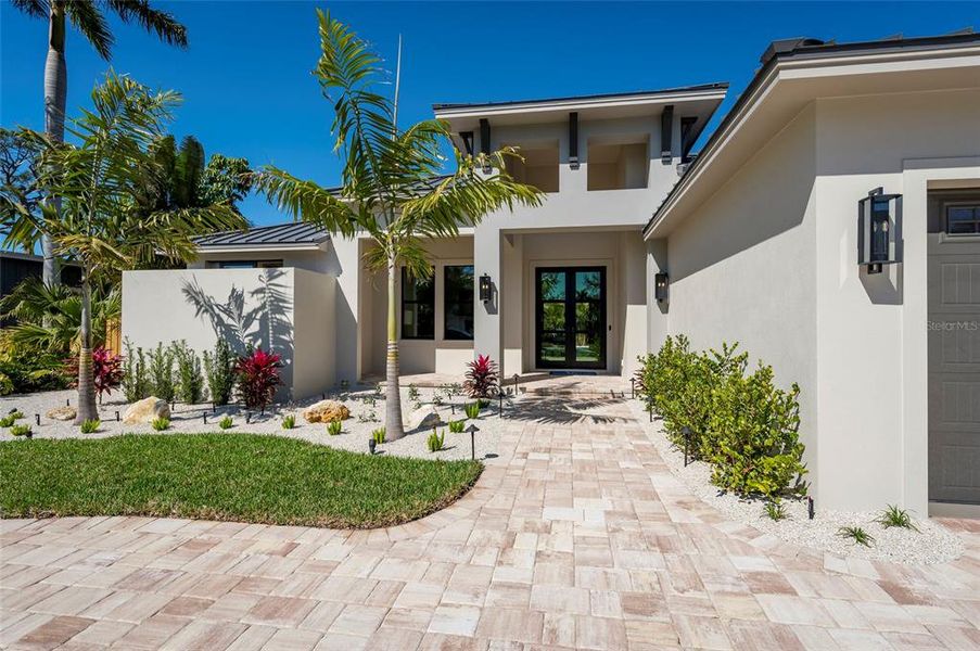 Exterior details and patio area of a home in , Sarasota (Image 30).