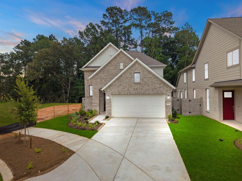 Front exterior of a new home in Two Step Farm, Montgomery, TX, highlighting curb appeal (Image 20). Front exterior of a new home in Two Step Farm, Montgomery, TX, highlighting curb appeal (Image 20).