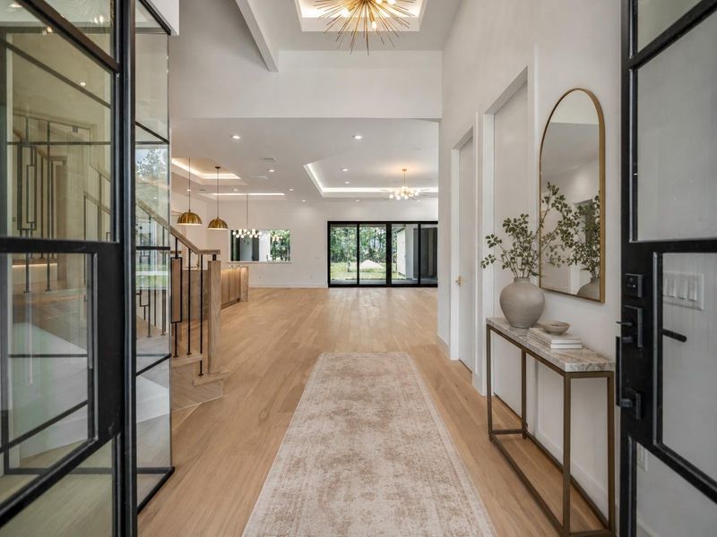 Grand Entry to the modern open floorpan provides such a beautiful sightline all the way through to the backyard. Grand Entry to the modern open floorpan provides such a beautiful sightline all the way through to the backyard.