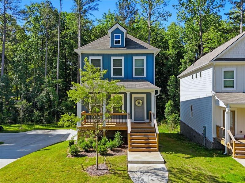 Front exterior of a new home in , Woodstock, GA, highlighting curb appeal (Image 27). Front exterior of a new home in , Woodstock, GA, highlighting curb appeal (Image 27).
