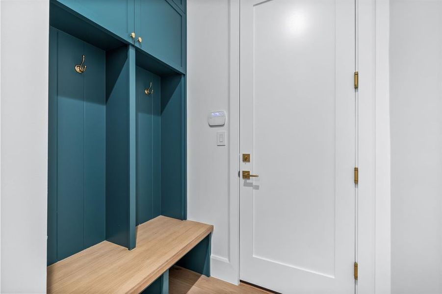 Mudroom featuring light wood-type flooring