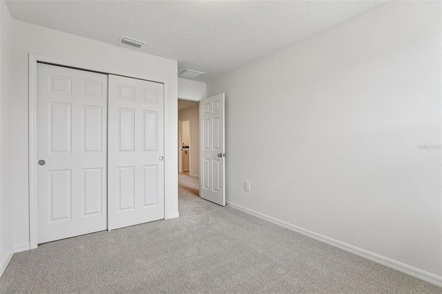 Spacious, unfurnished interior of a new home in Cagan Crossings West, Clermont (Image 31).