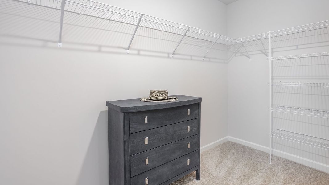 Representative furnished interior of a home built from the PENWELL by D.R. Horton in Preston Oaks, King (Image 13).