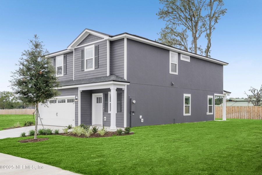 Front exterior of a new home in , Jacksonville, FL, highlighting curb appeal (Image 1).