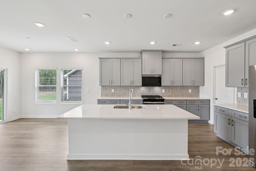 Photo is not of the actual home, but is an inspirational photo of builder’s model home and may depict options, furnishings, and/or decorator features that are not included