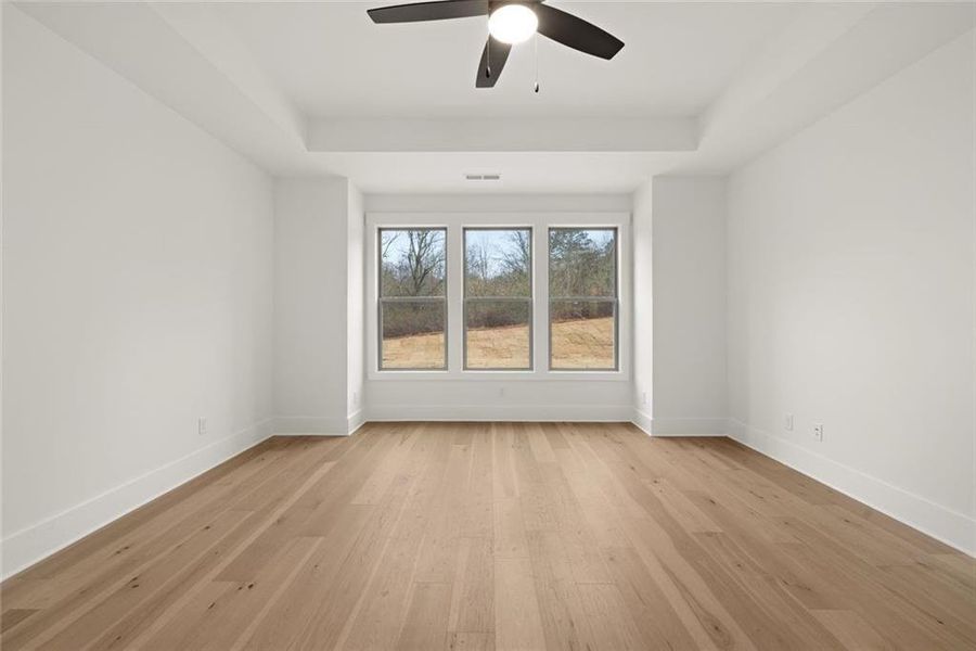 Spacious, unfurnished interior of a new home in Soleil Belmont Park, Canton (Image 48).