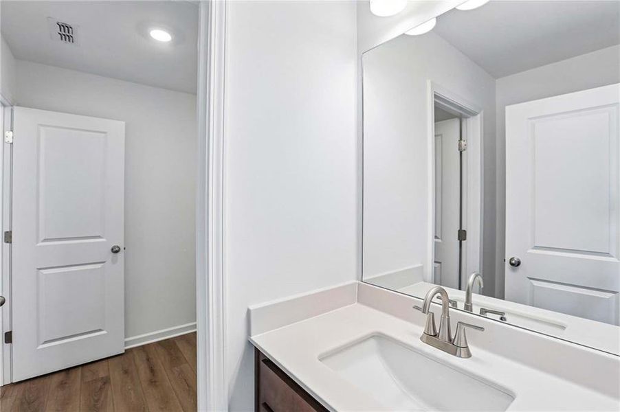 Furnished interior view inside a new home in Eastlyn Crossing, Flowery Branch (Image 7).