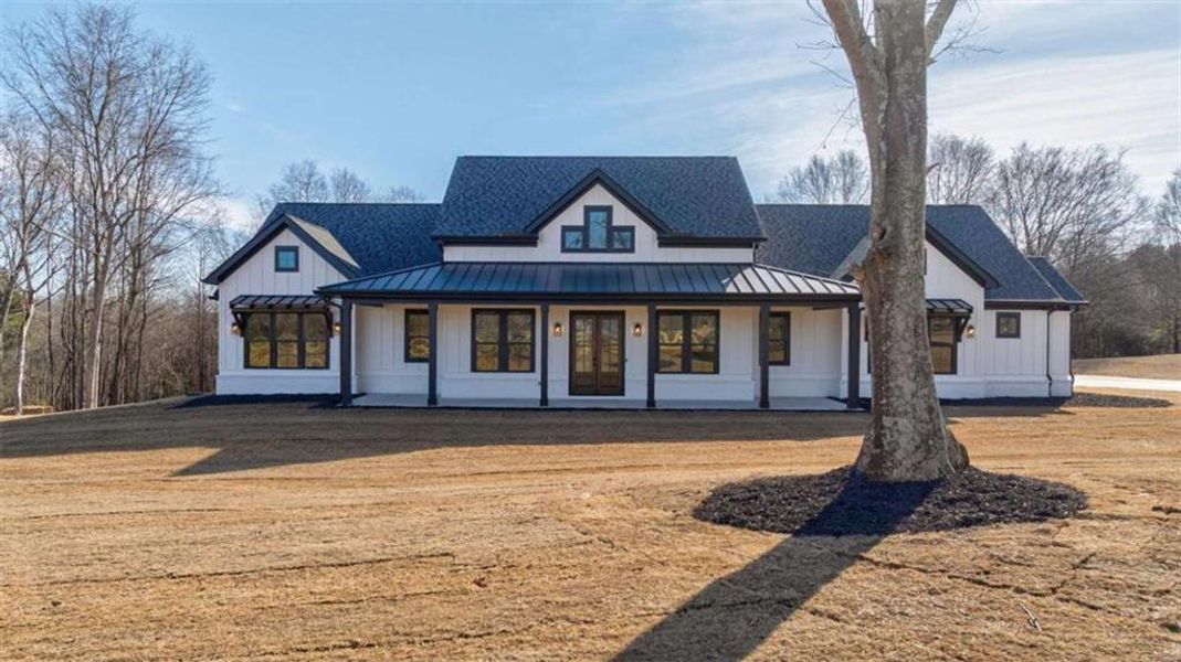 Front exterior of a new home in , Monroe, GA, highlighting curb appeal (Image 31).