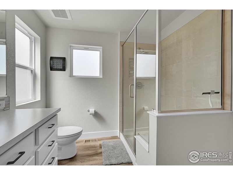 Primary bathroom with large walk-in shower