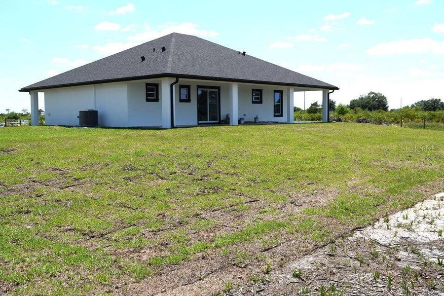 Exterior details and patio area of a home in , Okeechobee (Image 23).