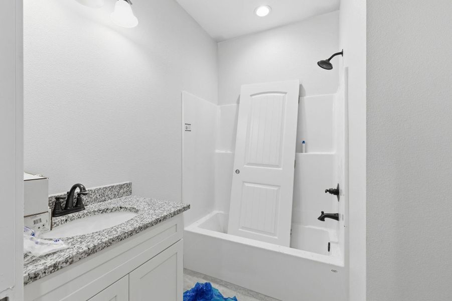 Furnished interior view inside a new home in Las Palomas Country Club Estates, La Vernia (Image 5).