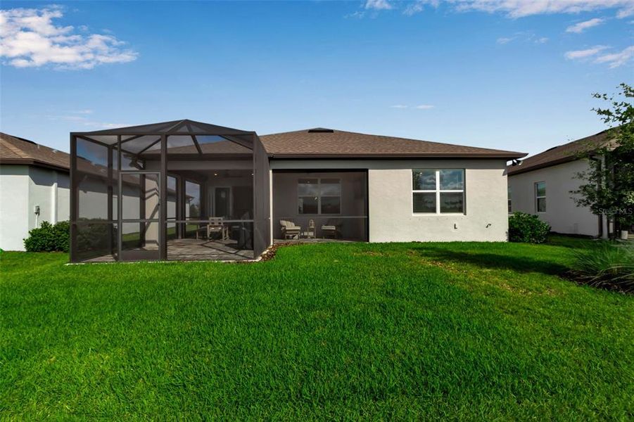 Front exterior of a new home in Del Webb BayView, Parrish, FL, highlighting curb appeal (Image 19). Front exterior of a new home in Del Webb BayView, Parrish, FL, highlighting curb appeal (Image 19).