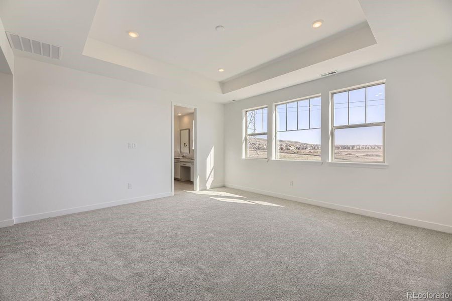 Spacious, unfurnished interior of a new home in Red Rocks Ranch: The Grand Collection, Morrison (Image 8).