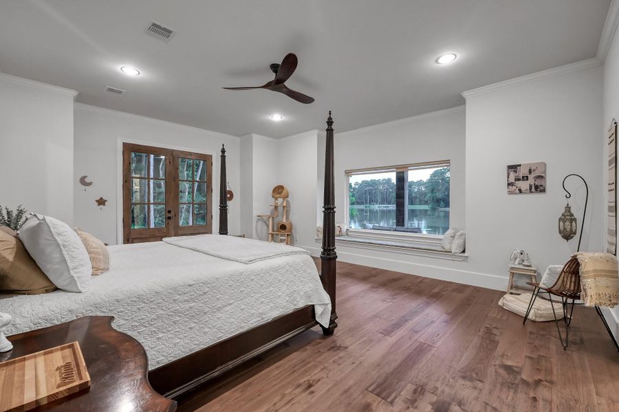 Half-bathroom features a chic vanity, sleek faucet, striking blue vertical tile accent wall, and stylish floating wooden shelves.