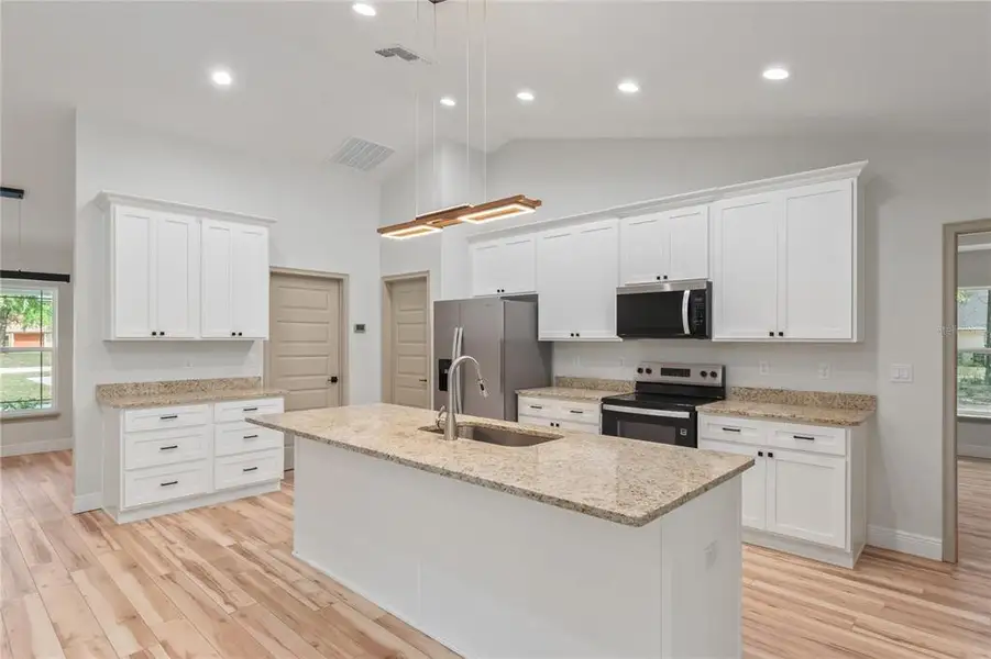 Furnished interior view inside a new home in , Ocala (Image 7).