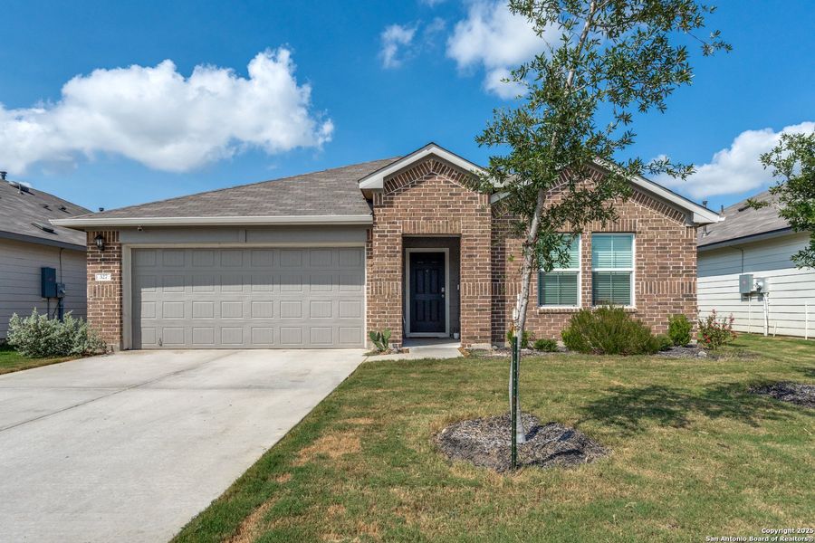 Front exterior of a new home in Heather Glen, New Braunfels, TX, highlighting curb appeal (Image 22).