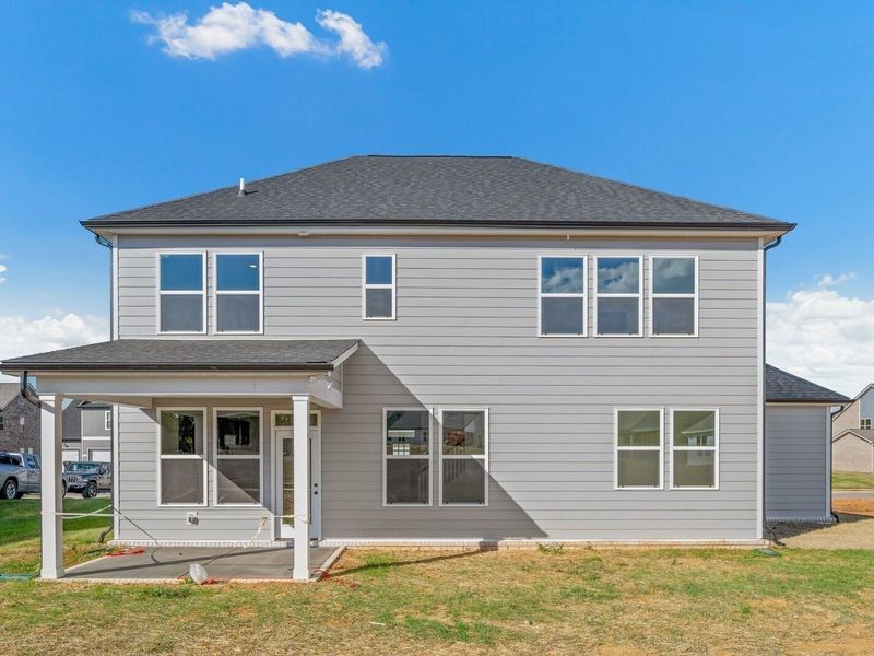 Exterior details and patio area of a home in Woods Crossing, Gallatin (Image 22).